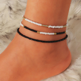 Produktbild: set of 3 white and black surfer anklets set of 3 white and black beach anklets